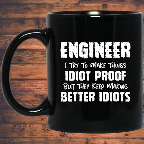 Engineer I Want To Make Things Idiot Proof But They Keep Making Better Idiots Mug | Engineer Gifts | Engineer 11 oz. Black Mug